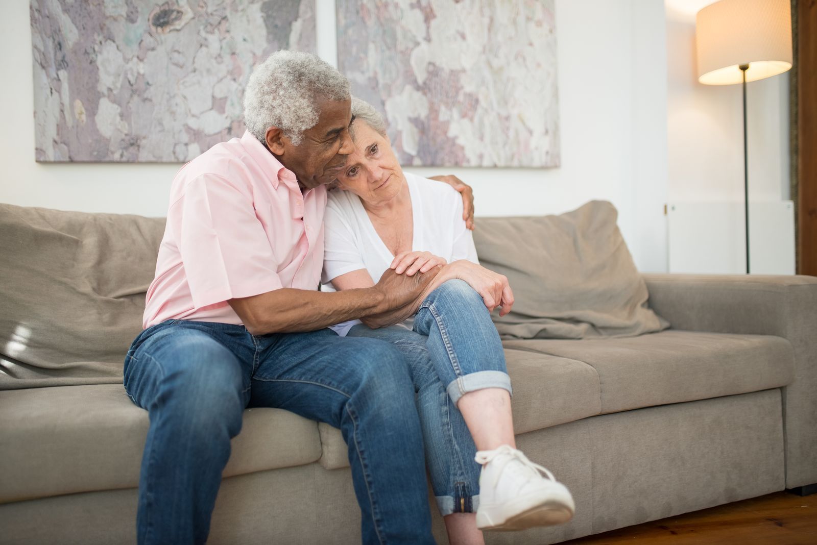 Older couple sharing a happy moment at home