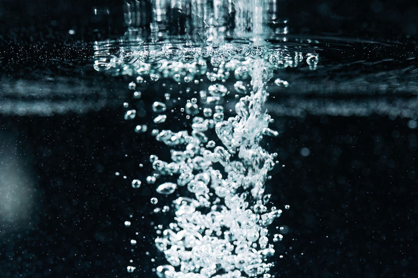 Rising oxygen bubbles in clear water
