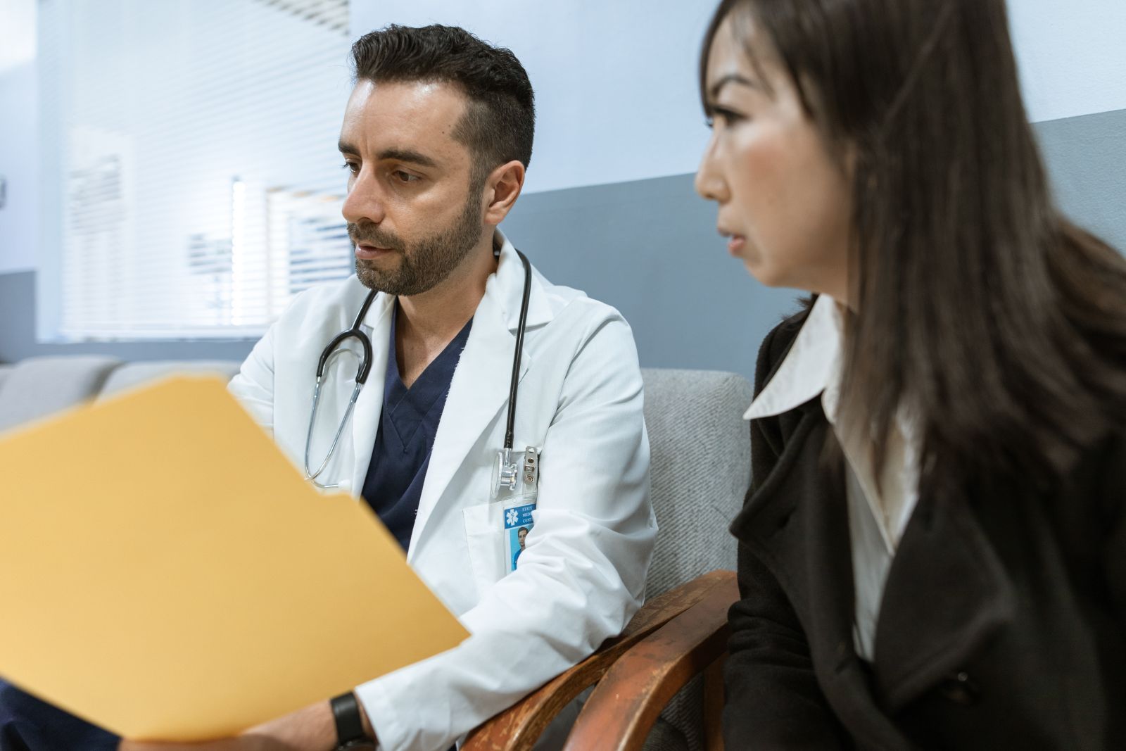Psychiatrist reviewing a treatment plan with a patient