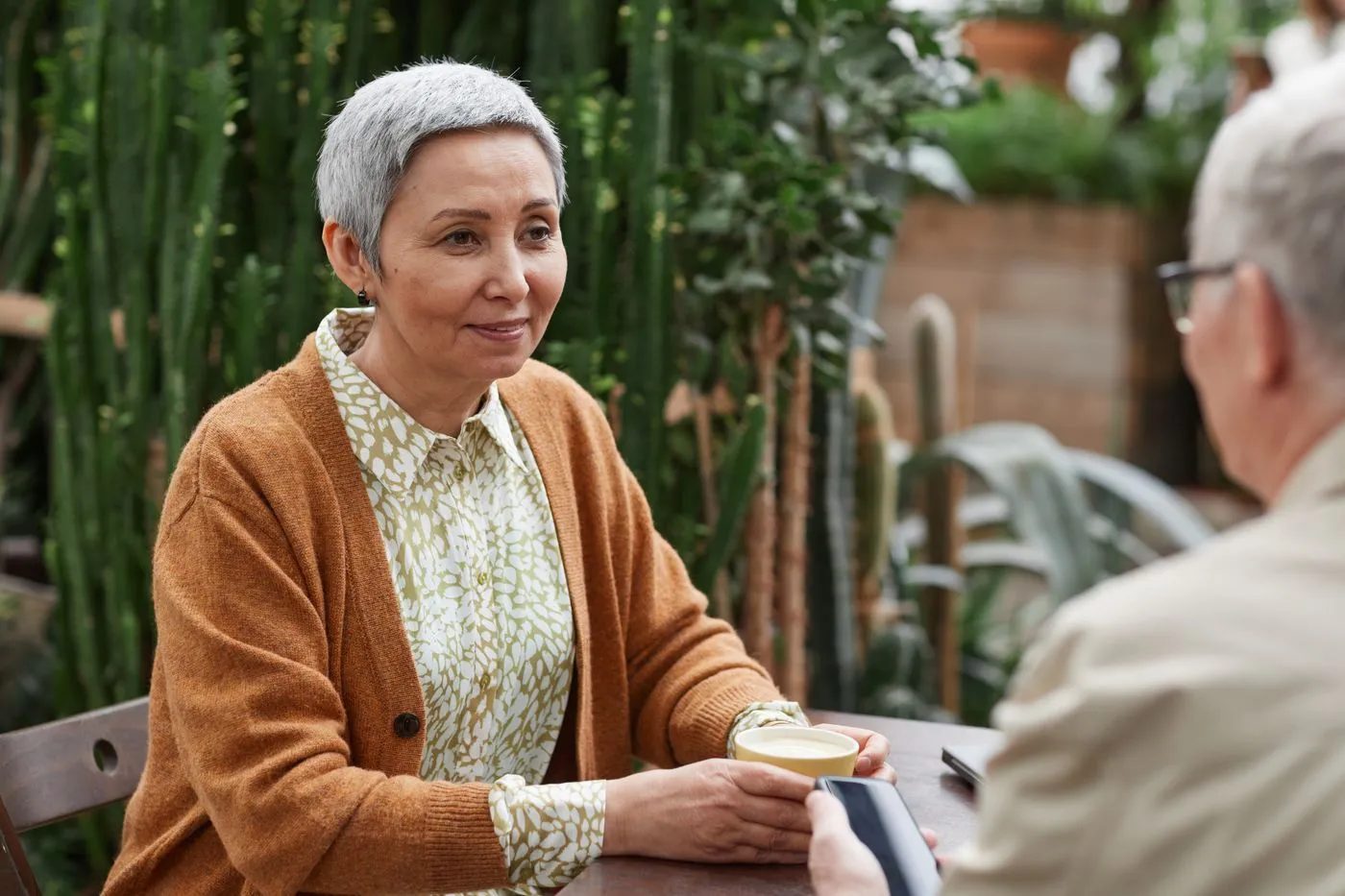 Older woman talking during a therapy session